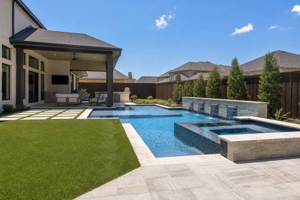 Frisco modern family pool with spa and turf