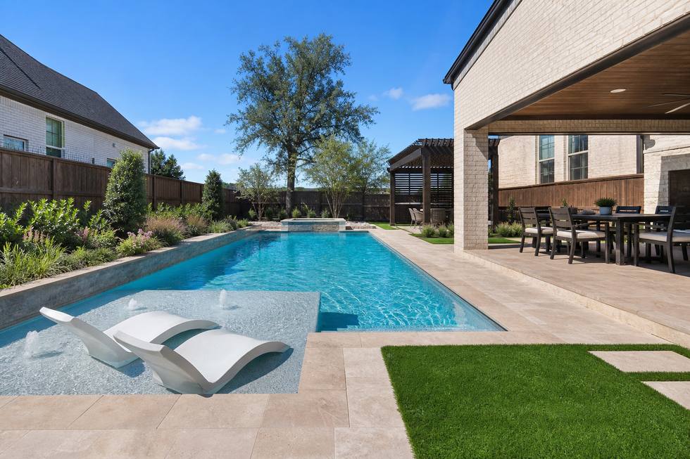 Roanoke family pool with tanning ledge and covered dining patio